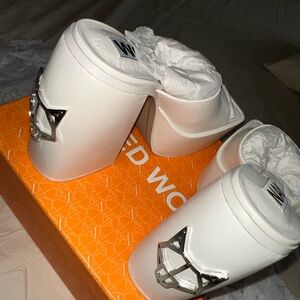 Naked Wolfe platform heels in the style “Jenna” no longer available. Brand new